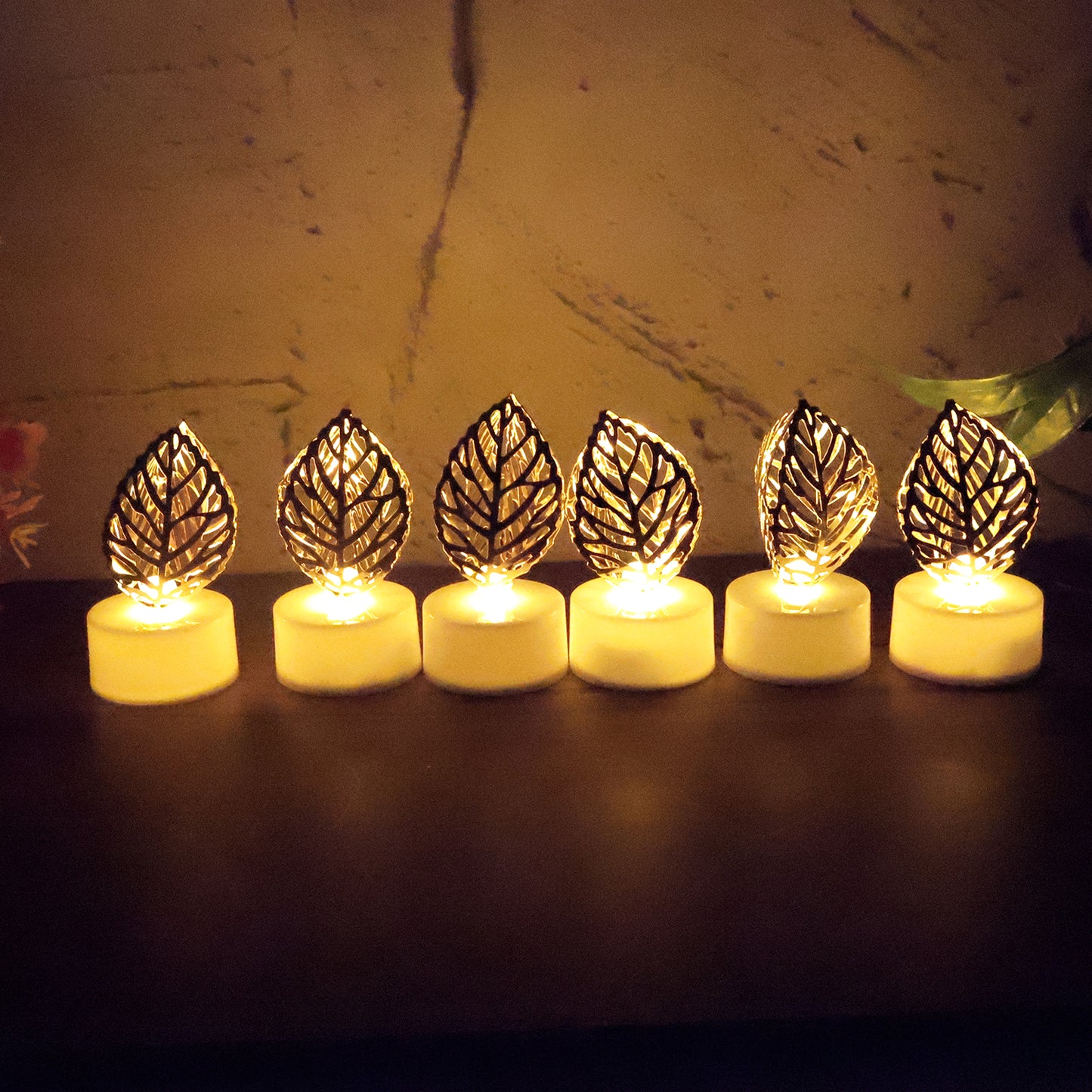Set of 12 Decorative Golden Leaf Shaped Flameless LED Candles – Flickering Light for Festive & Home Décor