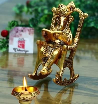 Golden Lord Ganesha on Rocking Chair Reading Ramayan – 17 cm