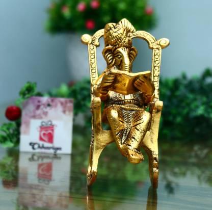 Golden Lord Ganesha on Rocking Chair Reading Ramayan – 17 cm