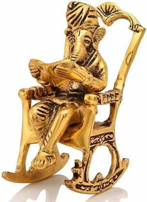 Golden Lord Ganesha on Rocking Chair Reading Ramayan – 17 cm