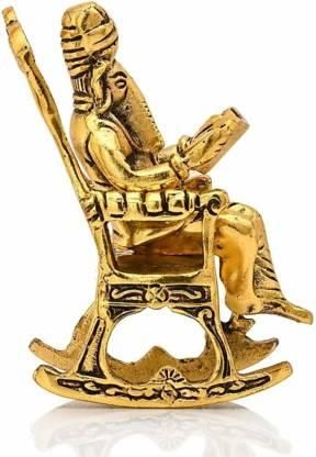 Golden Lord Ganesha on Rocking Chair Reading Ramayan – 17 cm