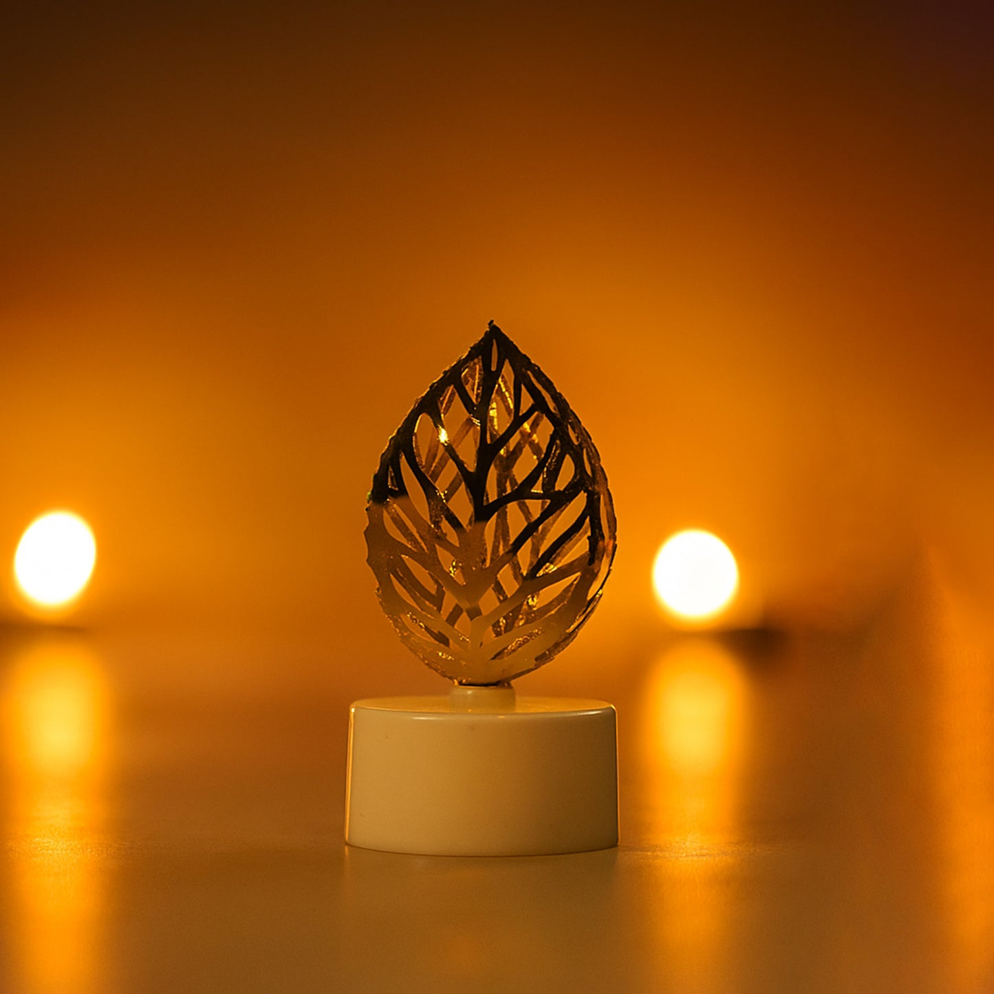 Set of 12 Decorative Golden Leaf Shaped Flameless LED Candles – Flickering Light for Festive & Home Décor